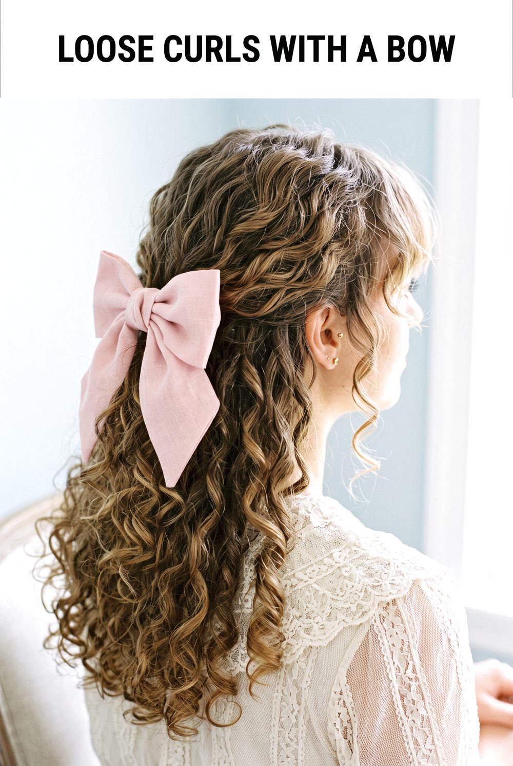 Loose Curls With Oversized Bow